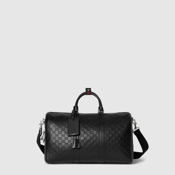 구찌 남성 GG 엠블럼 미디엄 더플백 - Gucci Mens GG Emblem Medium… - 1