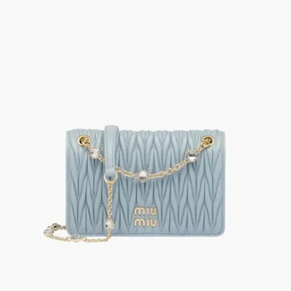미우미우 여성 블루 마트라세 크로스백 - MiuMiu Womens Blue Matelass… - 1