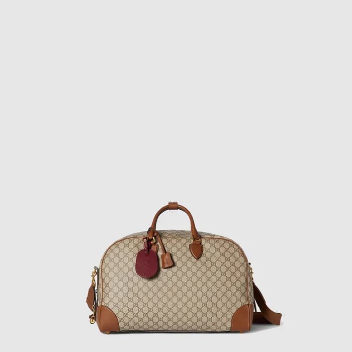 구찌 남성 GG 엠블럼 미디엄 더플백 - Gucci Mens GG Emblem Medium… - 1